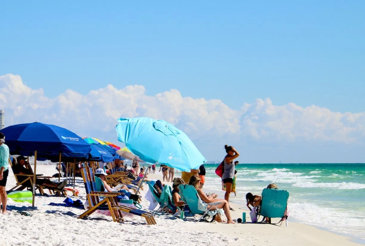 People Sitting on a beach Near Orlando