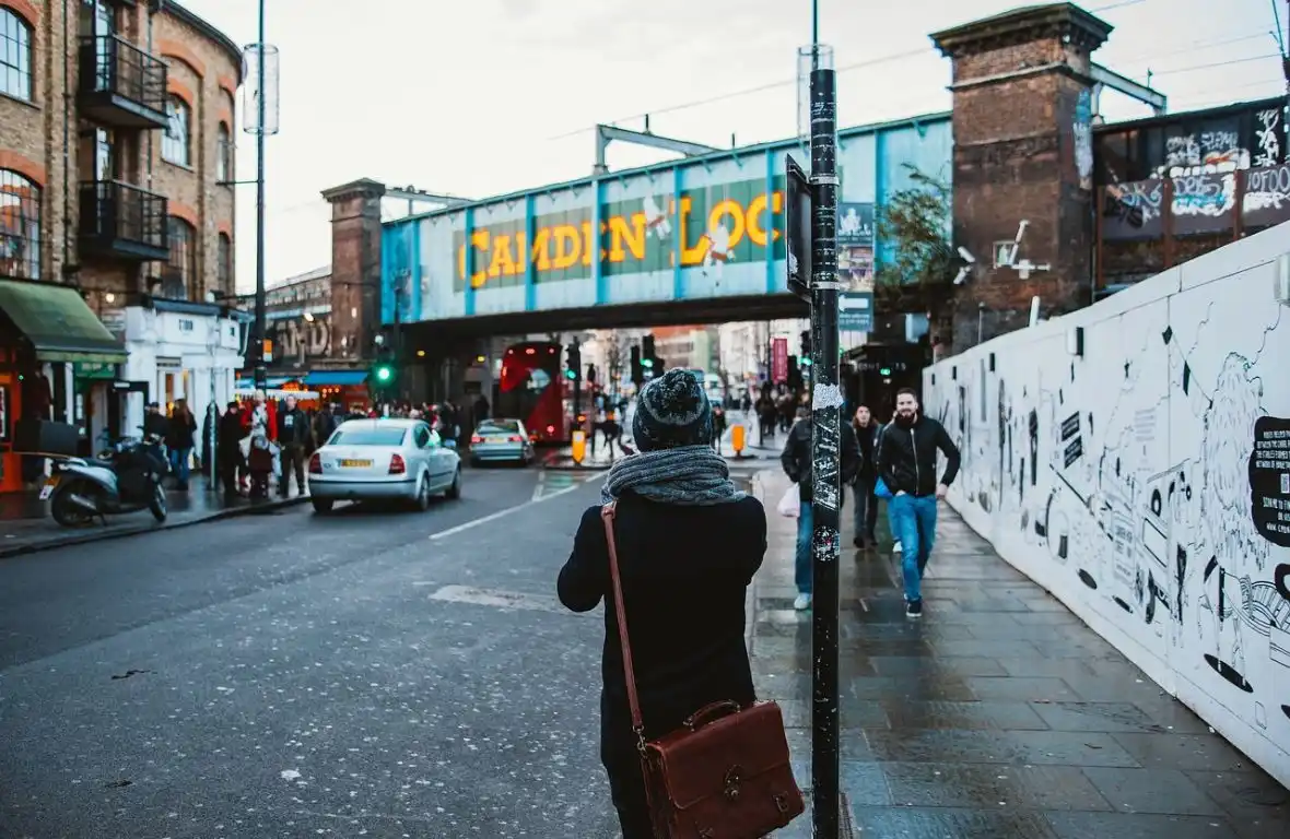 A woman standing near the Camden Market, London